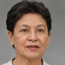 Joyful white middle-aged female with short  brown hair and brown eyes