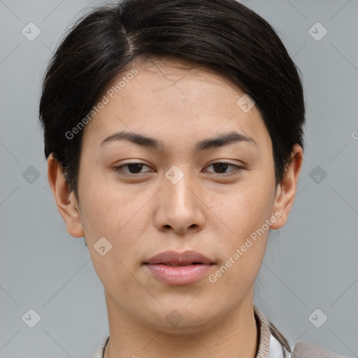 Joyful asian young-adult female with short  brown hair and brown eyes