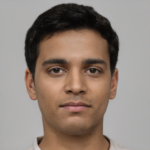 Neutral latino young-adult male with short  brown hair and brown eyes