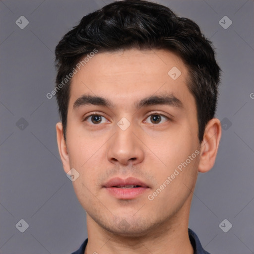 Neutral white young-adult male with short  black hair and brown eyes