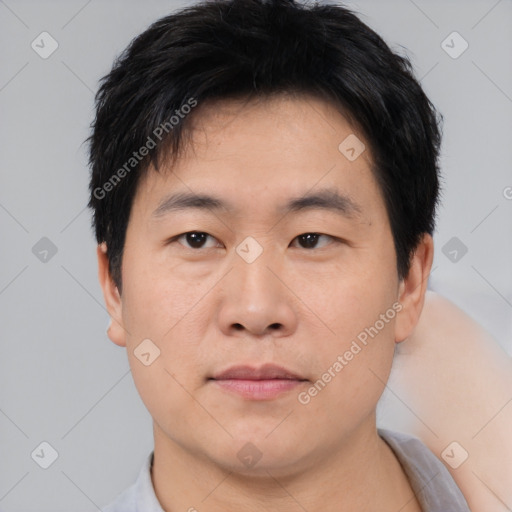 Neutral asian young-adult male with short  black hair and brown eyes