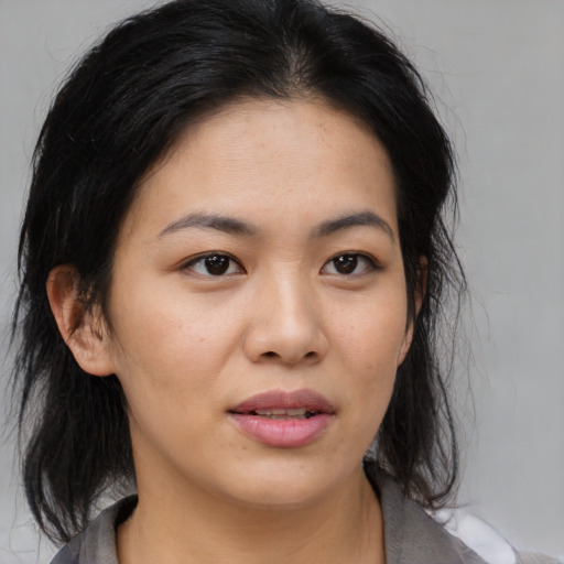 Neutral asian young-adult female with medium  brown hair and brown eyes