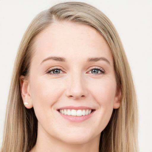 Joyful white young-adult female with long  brown hair and blue eyes