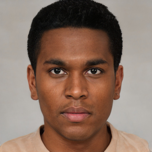 Neutral black young-adult male with short  brown hair and brown eyes