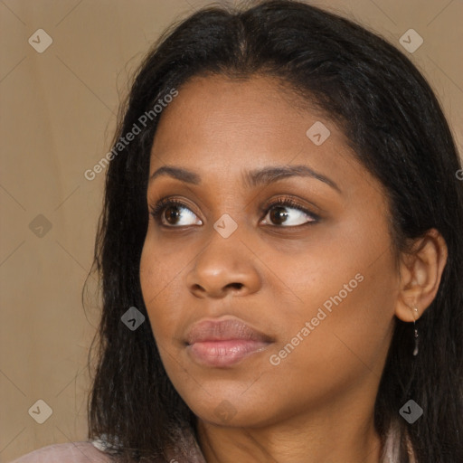 Joyful asian young-adult female with long  brown hair and brown eyes