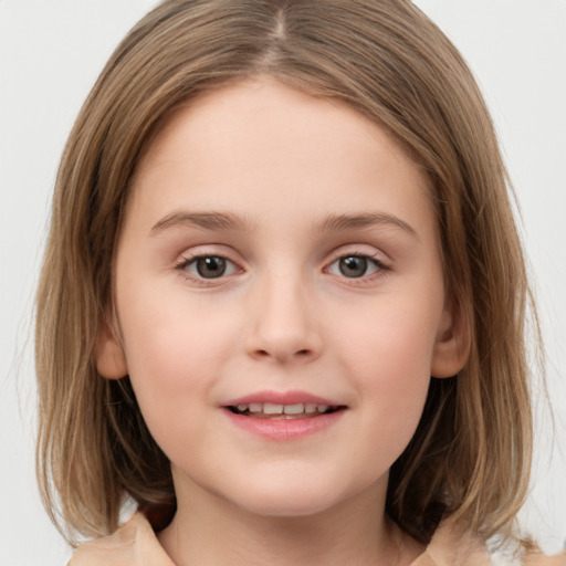 Joyful white child female with medium  brown hair and brown eyes