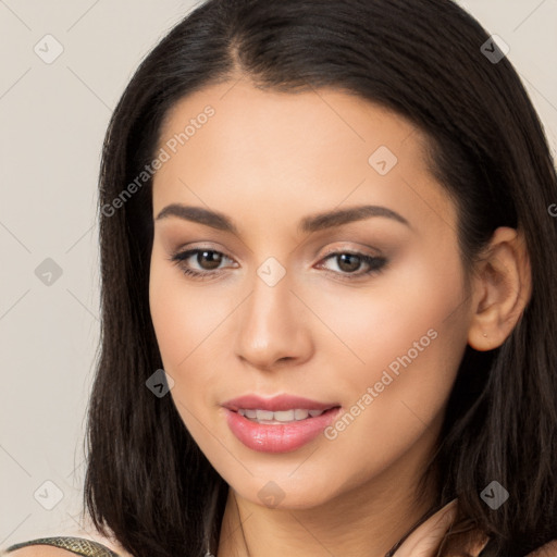 Joyful latino young-adult female with long  brown hair and brown eyes