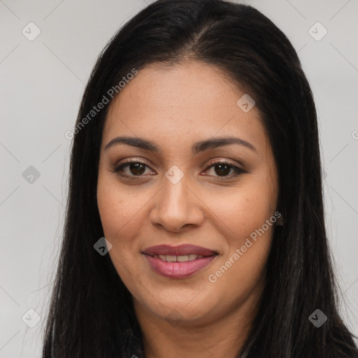 Joyful latino young-adult female with long  brown hair and brown eyes