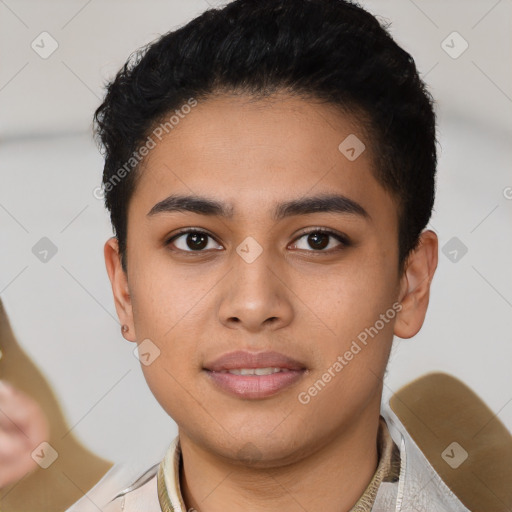 Joyful latino young-adult male with short  brown hair and brown eyes