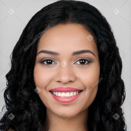 Joyful latino young-adult female with long  black hair and brown eyes