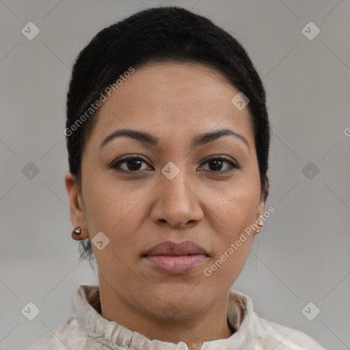 Joyful latino young-adult female with short  brown hair and brown eyes