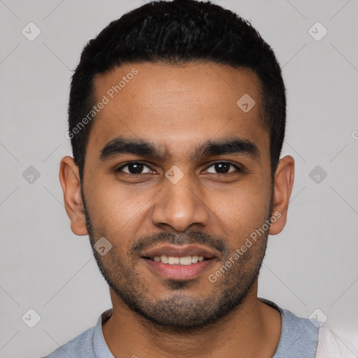 Joyful latino young-adult male with short  black hair and brown eyes