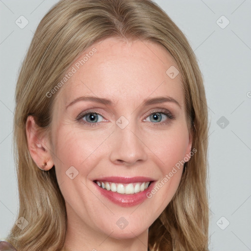 Joyful white young-adult female with long  brown hair and blue eyes