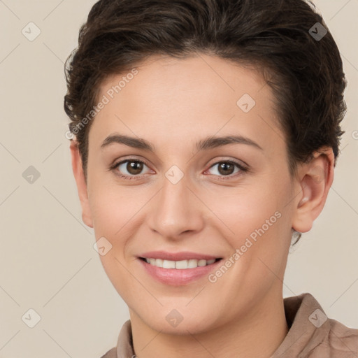 Joyful white young-adult female with short  brown hair and brown eyes