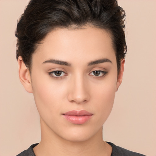 Neutral white young-adult female with short  brown hair and brown eyes