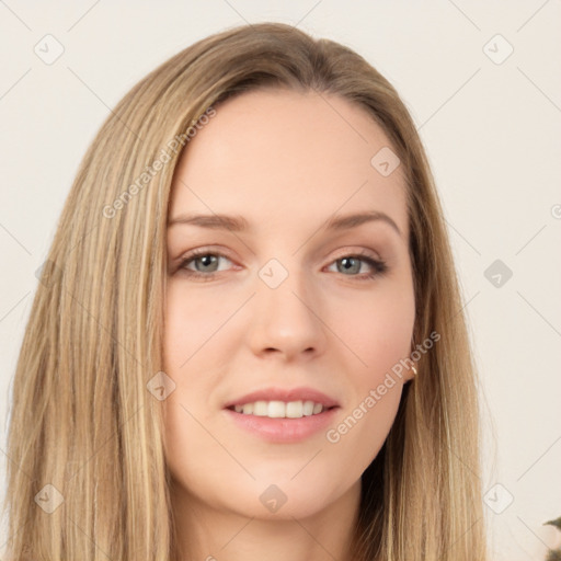 Joyful white young-adult female with long  brown hair and green eyes