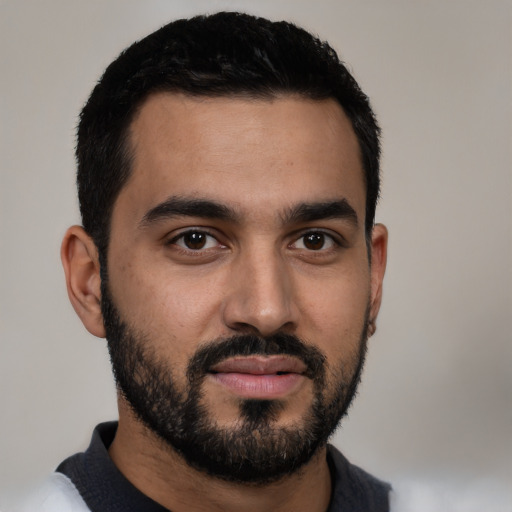 Neutral latino young-adult male with short  black hair and brown eyes