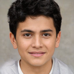 Joyful white child male with short  brown hair and brown eyes