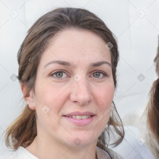 Joyful white adult female with medium  brown hair and grey eyes