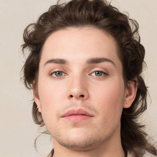 Neutral white young-adult male with medium  brown hair and brown eyes