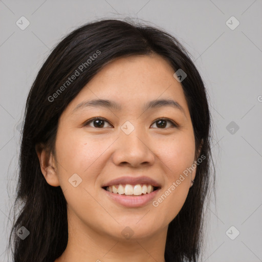 Joyful white young-adult female with long  brown hair and brown eyes