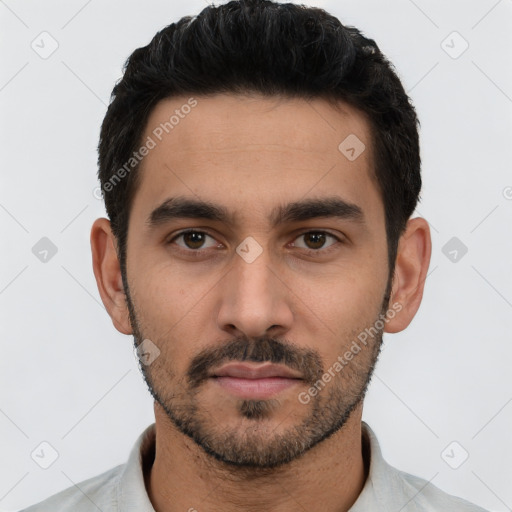Neutral white young-adult male with short  black hair and brown eyes
