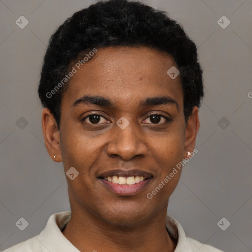 Joyful black young-adult male with short  black hair and brown eyes