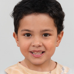 Joyful white child male with short  brown hair and brown eyes