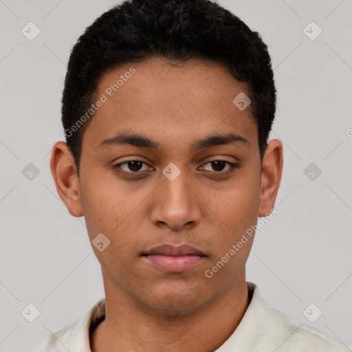 Neutral latino young-adult male with short  brown hair and brown eyes