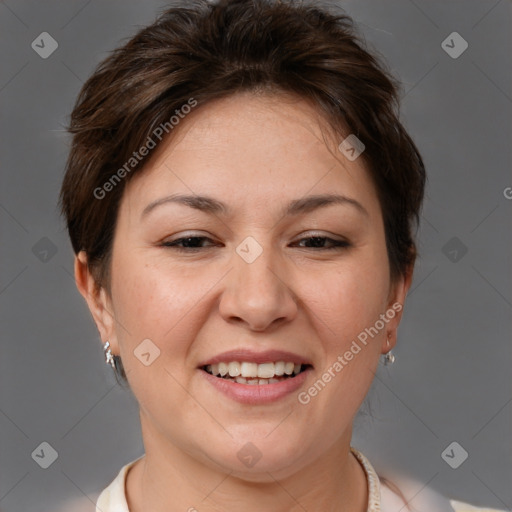 Joyful white adult female with short  brown hair and brown eyes