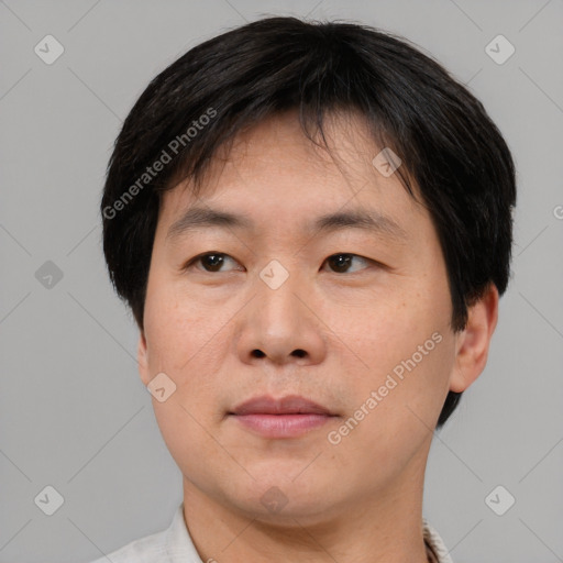 Neutral asian young-adult male with short  black hair and brown eyes