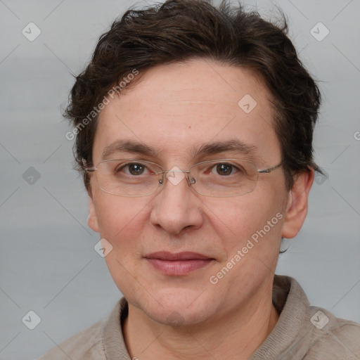 Joyful white adult female with short  brown hair and brown eyes