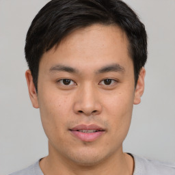 Neutral asian young-adult male with short  brown hair and brown eyes