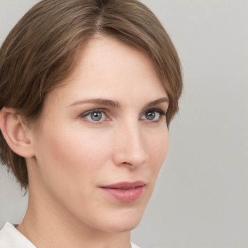 Neutral white young-adult female with medium  brown hair and grey eyes