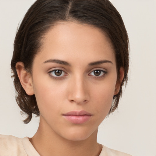 Neutral white young-adult female with medium  brown hair and brown eyes