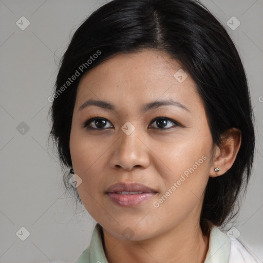 Joyful asian young-adult female with medium  black hair and brown eyes