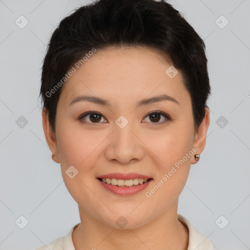 Joyful asian young-adult female with short  brown hair and brown eyes