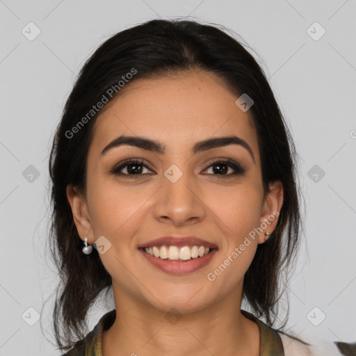 Joyful latino young-adult female with medium  black hair and brown eyes