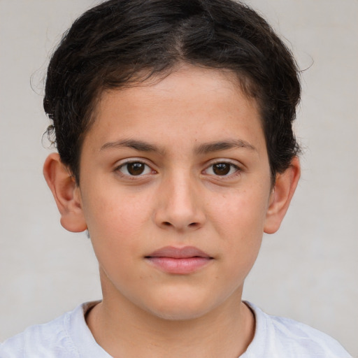 Joyful white child female with short  brown hair and brown eyes