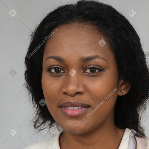 Joyful black young-adult female with medium  black hair and brown eyes