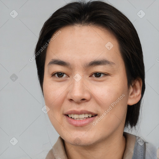 Joyful asian young-adult female with medium  brown hair and brown eyes