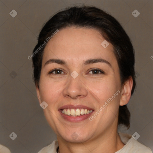 Joyful white adult female with medium  brown hair and brown eyes