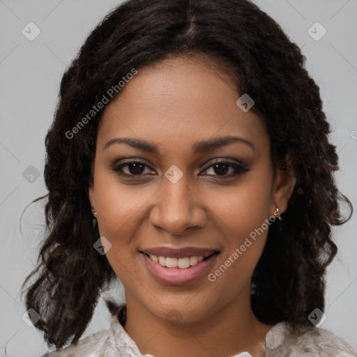 Joyful black young-adult female with medium  brown hair and brown eyes