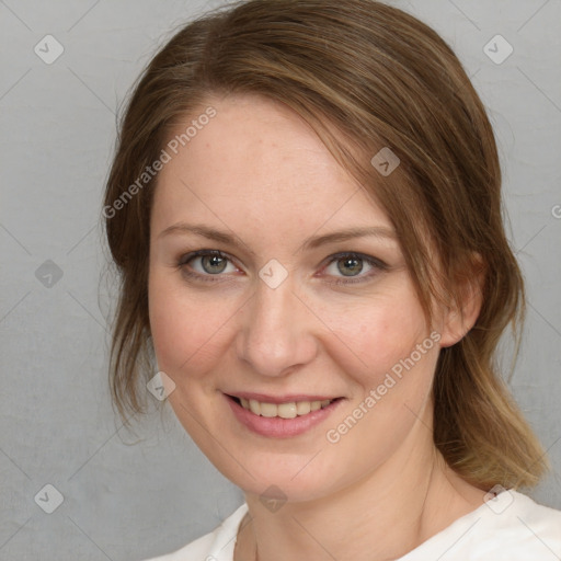 Joyful white young-adult female with medium  brown hair and blue eyes