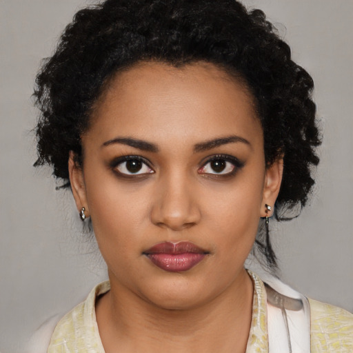 Neutral black young-adult female with medium  black hair and brown eyes