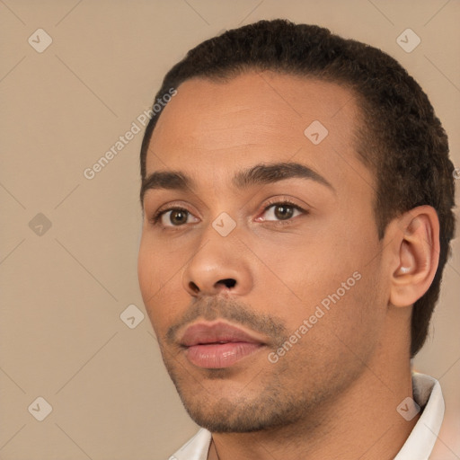 Neutral white young-adult male with short  black hair and brown eyes