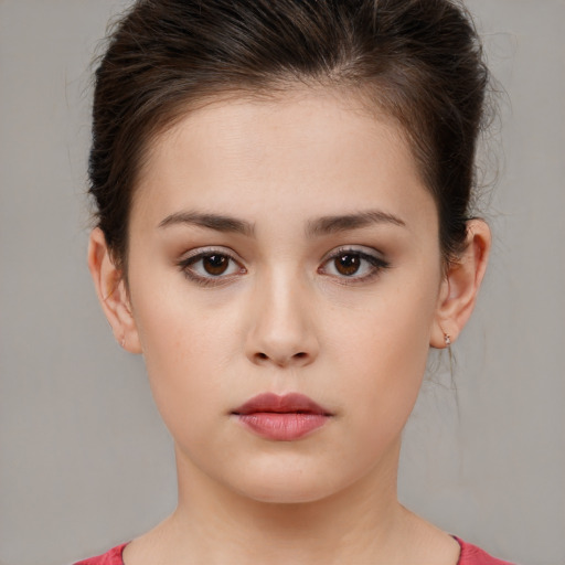 Neutral white young-adult female with short  brown hair and brown eyes