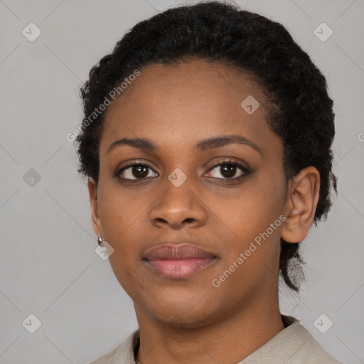 Neutral black young-adult female with short  black hair and brown eyes