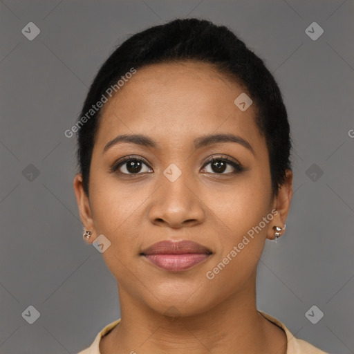 Joyful black young-adult female with short  brown hair and brown eyes