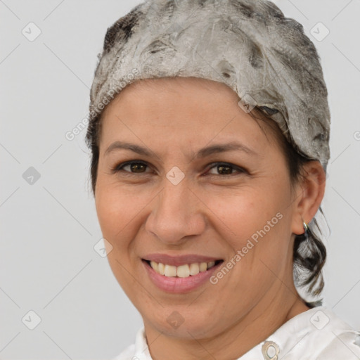 Joyful white adult female with short  brown hair and brown eyes